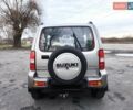 Серый Сузуки Джимни, объемом двигателя 1.3 л и пробегом 90 тыс. км за 13999 $, фото 7 на Automoto.ua