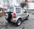 Серый Сузуки Джимни, объемом двигателя 1.3 л и пробегом 90 тыс. км за 13999 $, фото 3 на Automoto.ua