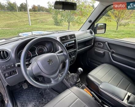 Сірий Сузукі Джімні, об'ємом двигуна 1.3 л та пробігом 43 тис. км за 16500 $, фото 8 на Automoto.ua
