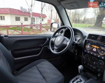 Серый Сузуки Джимни, объемом двигателя 1.3 л и пробегом 90 тыс. км за 13999 $, фото 14 на Automoto.ua
