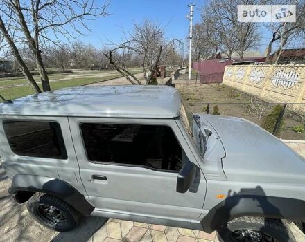 Сірий Сузукі Джімні, об'ємом двигуна 1.5 л та пробігом 12 тис. км за 19000 $, фото 17 на Automoto.ua