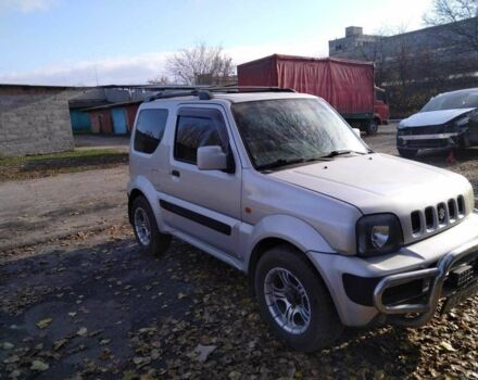 Серый Сузуки Джимни, объемом двигателя 1.3 л и пробегом 73 тыс. км за 274 $, фото 1 на Automoto.ua