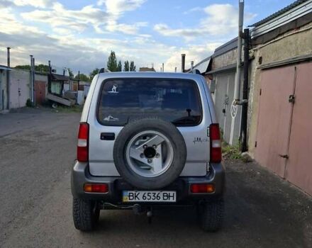 Сірий Сузукі Джімні, об'ємом двигуна 1.5 л та пробігом 105 тис. км за 9199 $, фото 1 на Automoto.ua