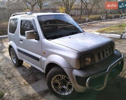 Серый Сузуки Джимни, объемом двигателя 1.3 л и пробегом 73 тыс. км за 11500 $, фото 1 на Automoto.ua