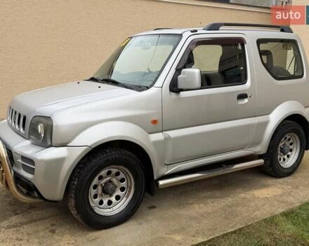 Серый Сузуки Джимни, объемом двигателя 1.3 л и пробегом 53 тыс. км за 10900 $, фото 1 на Automoto.ua