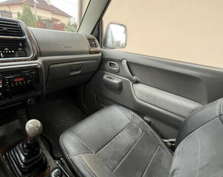 Синій Сузукі Джімні, об'ємом двигуна 1.3 л та пробігом 172 тис. км за 7150 $, фото 30 на Automoto.ua