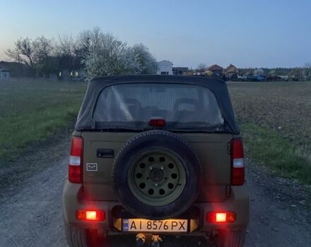 Зеленый Сузуки Джимни, объемом двигателя 1.3 л и пробегом 186 тыс. км за 6100 $, фото 3 на Automoto.ua