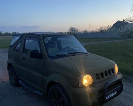 Зеленый Сузуки Джимни, объемом двигателя 1.3 л и пробегом 186 тыс. км за 6100 $, фото 2 на Automoto.ua
