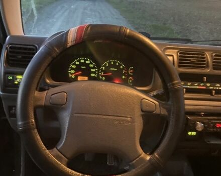 Зеленый Сузуки Джимни, объемом двигателя 1.3 л и пробегом 186 тыс. км за 6100 $, фото 6 на Automoto.ua