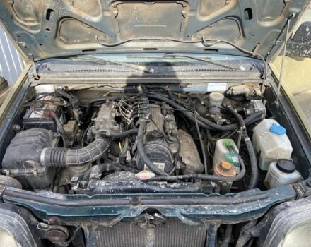 Зеленый Сузуки Джимни, объемом двигателя 1.3 л и пробегом 186 тыс. км за 6100 $, фото 7 на Automoto.ua