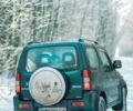 Зеленый Сузуки Джимни, объемом двигателя 1.46 л и пробегом 171 тыс. км за 9000 $, фото 3 на Automoto.ua