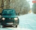 Зеленый Сузуки Джимни, объемом двигателя 1.46 л и пробегом 171 тыс. км за 9000 $, фото 1 на Automoto.ua