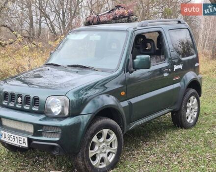 Зелений Сузукі Джімні, об'ємом двигуна 1.3 л та пробігом 170 тис. км за 8700 $, фото 6 на Automoto.ua