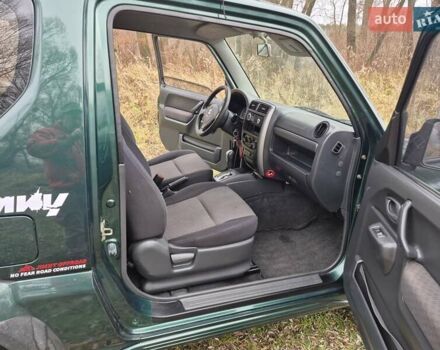 Зелений Сузукі Джімні, об'ємом двигуна 1.3 л та пробігом 170 тис. км за 8700 $, фото 13 на Automoto.ua