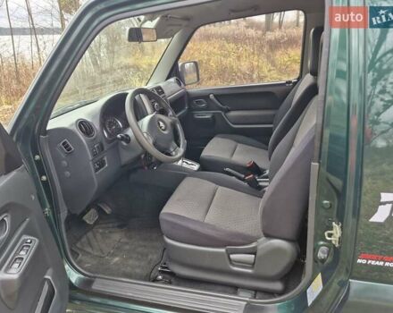 Зелений Сузукі Джімні, об'ємом двигуна 1.3 л та пробігом 170 тис. км за 8700 $, фото 12 на Automoto.ua