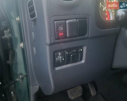 Сузуки Джимни 2006 в Киеве на Automoto.ua Зеленый Сузуки Джимни, объемом двигателя 1.3 л и пробегом 170 тыс. км за 8750 $, фото 12 на Automoto.ua