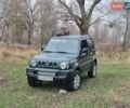 Зелений Сузукі Джімні, об'ємом двигуна 1.3 л та пробігом 170 тис. км за 8700 $, фото 9 на Automoto.ua