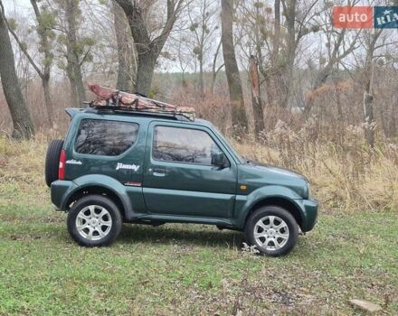 Зелений Сузукі Джімні, об'ємом двигуна 1.3 л та пробігом 170 тис. км за 8700 $, фото 10 на Automoto.ua