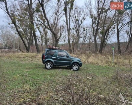 Зелений Сузукі Джімні, об'ємом двигуна 1.3 л та пробігом 170 тис. км за 8700 $, фото 11 на Automoto.ua