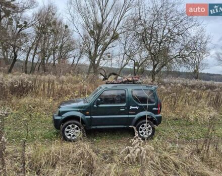 Зелений Сузукі Джімні, об'ємом двигуна 1.3 л та пробігом 170 тис. км за 8700 $, фото 5 на Automoto.ua