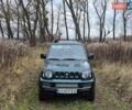 Зелений Сузукі Джімні, об'ємом двигуна 1.3 л та пробігом 170 тис. км за 8700 $, фото 2 на Automoto.ua