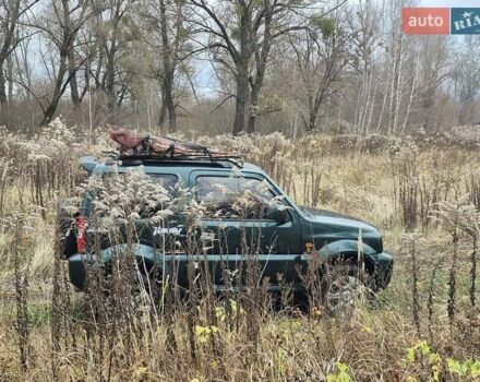 Зелений Сузукі Джімні, об'ємом двигуна 1.3 л та пробігом 170 тис. км за 8700 $, фото 1 на Automoto.ua