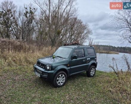 Зелений Сузукі Джімні, об'ємом двигуна 1.3 л та пробігом 170 тис. км за 8700 $, фото 4 на Automoto.ua