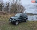 Зелений Сузукі Джімні, об'ємом двигуна 1.3 л та пробігом 170 тис. км за 8700 $, фото 4 на Automoto.ua