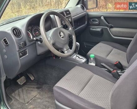 Зелений Сузукі Джімні, об'ємом двигуна 1.3 л та пробігом 170 тис. км за 8700 $, фото 17 на Automoto.ua