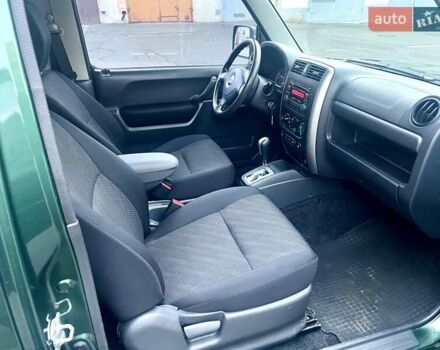 Зелений Сузукі Джімні, об'ємом двигуна 1.33 л та пробігом 112 тис. км за 12500 $, фото 10 на Automoto.ua