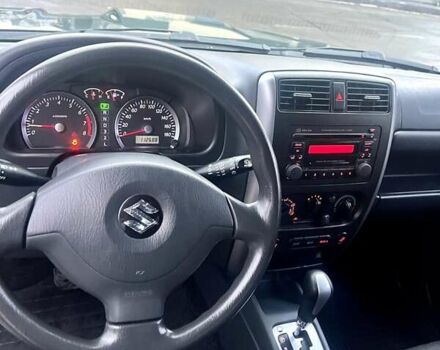 Зелений Сузукі Джімні, об'ємом двигуна 1.33 л та пробігом 112 тис. км за 12500 $, фото 11 на Automoto.ua