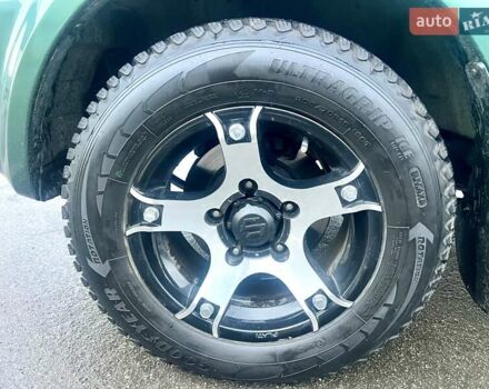 Зелений Сузукі Джімні, об'ємом двигуна 1.33 л та пробігом 112 тис. км за 12500 $, фото 15 на Automoto.ua