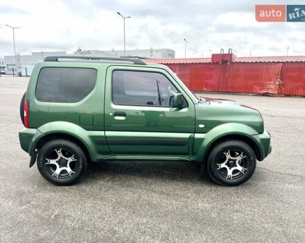 Зелений Сузукі Джімні, об'ємом двигуна 1.33 л та пробігом 112 тис. км за 12500 $, фото 6 на Automoto.ua