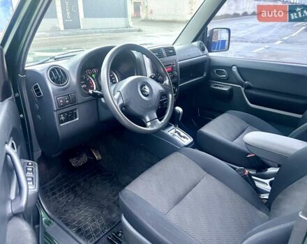 Зелений Сузукі Джімні, об'ємом двигуна 1.33 л та пробігом 112 тис. км за 12500 $, фото 9 на Automoto.ua