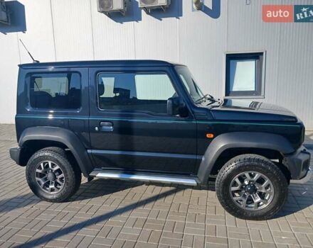 Зеленый Сузуки Джимни, объемом двигателя 1.46 л и пробегом 52 тыс. км за 20990 $, фото 2 на Automoto.ua