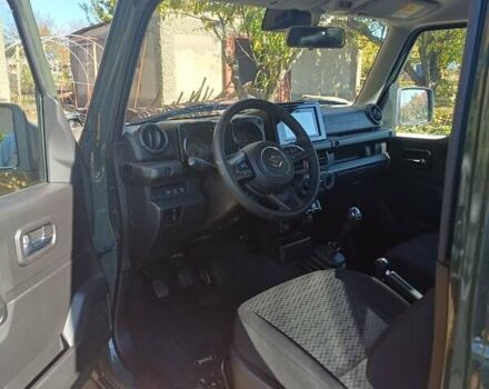 Зеленый Сузуки Джимни, объемом двигателя 1.46 л и пробегом 8 тыс. км за 20000 $, фото 2 на Automoto.ua