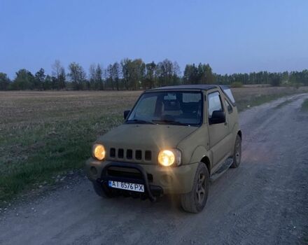 Зеленый Сузуки Джимни, объемом двигателя 1.3 л и пробегом 186 тыс. км за 6300 $, фото 1 на Automoto.ua