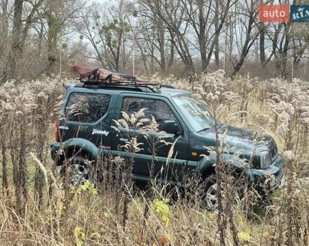 Зеленый Сузуки Джимни, объемом двигателя 1.3 л и пробегом 170 тыс. км за 8700 $, фото 1 на Automoto.ua