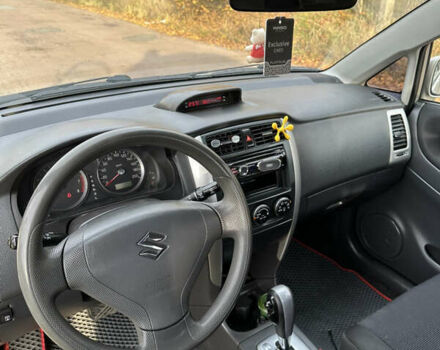 Бежевий Сузукі Ліана, об'ємом двигуна 1.59 л та пробігом 186 тис. км за 4200 $, фото 5 на Automoto.ua