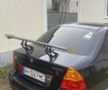 Чорний Сузукі Ліана, об'ємом двигуна 1.5 л та пробігом 167 тис. км за 4200 $, фото 1 на Automoto.ua