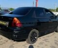 Чорний Сузукі Ліана, об'ємом двигуна 1.6 л та пробігом 216 тис. км за 3300 $, фото 6 на Automoto.ua