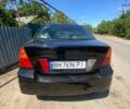Черный Сузуки Лиана, объемом двигателя 1.6 л и пробегом 260 тыс. км за 4500 $, фото 1 на Automoto.ua