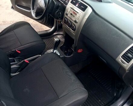 Черный Сузуки Лиана, объемом двигателя 1.6 л и пробегом 218 тыс. км за 5200 $, фото 4 на Automoto.ua