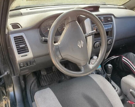 Черный Сузуки Лиана, объемом двигателя 1.6 л и пробегом 300 тыс. км за 3900 $, фото 17 на Automoto.ua