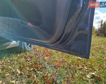 Черный Сузуки Лиана, объемом двигателя 1.6 л и пробегом 300 тыс. км за 3900 $, фото 9 на Automoto.ua