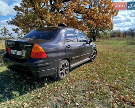 Черный Сузуки Лиана, объемом двигателя 1.6 л и пробегом 300 тыс. км за 3900 $, фото 2 на Automoto.ua