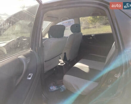 Черный Сузуки Лиана, объемом двигателя 1.6 л и пробегом 300 тыс. км за 3900 $, фото 15 на Automoto.ua