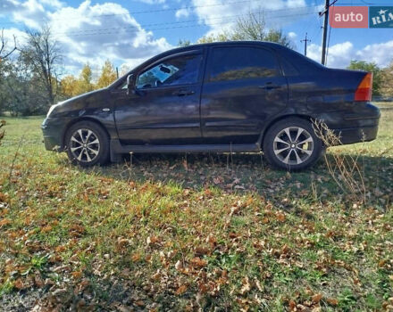 Черный Сузуки Лиана, объемом двигателя 1.6 л и пробегом 300 тыс. км за 3900 $, фото 4 на Automoto.ua
