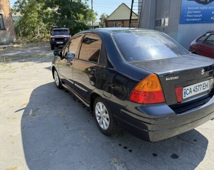 Чорний Сузукі Ліана, об'ємом двигуна 1.6 л та пробігом 115 тис. км за 4550 $, фото 7 на Automoto.ua