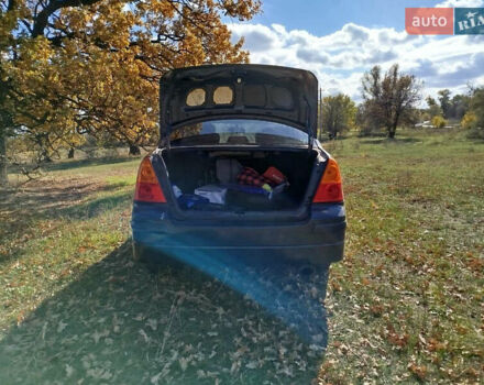 Черный Сузуки Лиана, объемом двигателя 1.6 л и пробегом 300 тыс. км за 3900 $, фото 5 на Automoto.ua